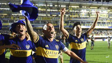BUENOS AIRES, ARGENTINA - MARCH 07: Carlos Tevez and Guillermo Fernandez of Boca Juniors celebrate winning the Superliga 2019/20 before a match between Boca Juniors and Gimnasia as part of Superliga 2019/20 at Estadio Alberto J. Armando on March 7, 2020 in Buenos Aires, Argentina. (Photo by Rodrigo Valle/Getty Images)