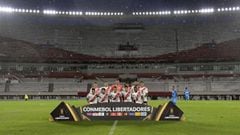 Players of Argentina&#039;s team River Plate pose for pictures at an empty Monumental stadium in Buenos Aires before the Copa Libertadores group D football match against Peru&#039;s Deportivo Binacional