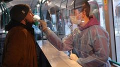 A medical worker takes a nasal swab from a man at a Covid-19 testing bus that will serve the 72nd Berlin International Film Festival, also called the Berlinale, during the Omicron wave of the coronavirus pandemic on February 08, 2022 in Berlin, Germany.