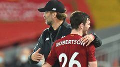 Soccer Football - Premier League - Liverpool v Crystal Palace - Anfield, Liverpool, Britain - June 24, 2020 Liverpool&#039;s Andrew Robertson hugs Liverpool manager Juergen Klopp as he is substituted off as play resumes behind closed doors following the o