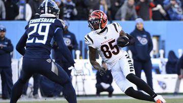 Jan 22, 2022; Nashville, Tennessee, USA; Cincinnati Bengals wide receiver Tee Higgins (85) runs after a catch during the first half of an AFC Divisional playoff football game against the Tennessee Titans at Nissan Stadium. Mandatory Credit: Steve Roberts-