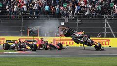 Formula One F1 - Mexico City Grand Prix - Autodromo Hermanos Rodriguez, Mexico City, Mexico - October 29, 2023 Red Bull's Sergio Perez crashes at the first corner of the race after contact with Ferrari's Charles Leclerc as Red Bull's Max Verstappen leads REUTERS/Raquel Cunha