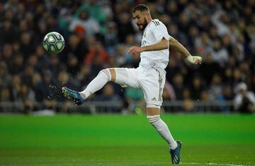 Real Madrid's French forward Karim Benzema controls the ball during the Spanish League football match between Real Madrid and Barcelona at the Santiago Bernabeu stadium in Madrid on March 1, 2020.