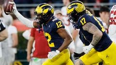 PASADENA, CALIFORNIA - JANUARY 01: Josh Wallace #12 of the Michigan Wolverines celebrates after recovering a fumble in the fourth quarter against the Alabama Crimson Tide during the CFP Semifinal Rose Bowl Game at Rose Bowl Stadium on January 01, 2024 in Pasadena, California.   Kevork Djansezian/Getty Images/AFP (Photo by KEVORK DJANSEZIAN / GETTY IMAGES NORTH AMERICA / Getty Images via AFP)