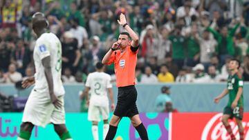 English referee Michael Oliver blows the whistle during the Qatar 2022 World Cup Group C football match between Saudi Arabia and Mexico at the Lusail Stadium in Lusail, north of Doha on November 30, 2022. (Photo by Alfredo ESTRELLA / AFP)