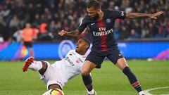 Dijon&#039;s French forward Wesley Said vies with Paris Saint-Germain&#039;s Brazilian defender Dani Alves  during the French L1 football match between Paris Saint-Germain (PSG) and Dijon at the Parc des princes stadium in Paris on May 18, 2019. (Photo by Anne-Christine POUJOULAT / AFP)