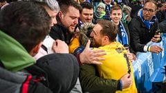 Slovenia's goalkeeper Jan Oblak celebrates with supporters his team's qualification at the end of the Group H Euro 2024 Qualifying football match between Slovenia and Kazakhstan at the Stadium Stozice in Ljubljana, on November 20, 2023. (Photo by Jure Makovec / AFP)