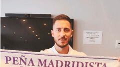 Hazard, con una bufanda del Real Madrid.