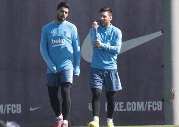 Luis Suárez and Leo Messi in training
