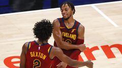 ATLANTA, GA - JANUARY 02: Darius Garland #10 of the Cleveland Cavaliers reacts with Collin Sexton #2 late in the second half against the Atlanta Hawks at State Farm Arena on January 2, 2021 in Atlanta, Georgia. NOTE TO USER: User expressly acknowledges and agrees that, by downloading and/or using this photograph, user is consenting to the terms and conditions of the Getty Images License Agreement.   Todd Kirkland/Getty Images/AFP == FOR NEWSPAPERS, INTERNET, TELCOS &amp; TELEVISION USE ONLY ==