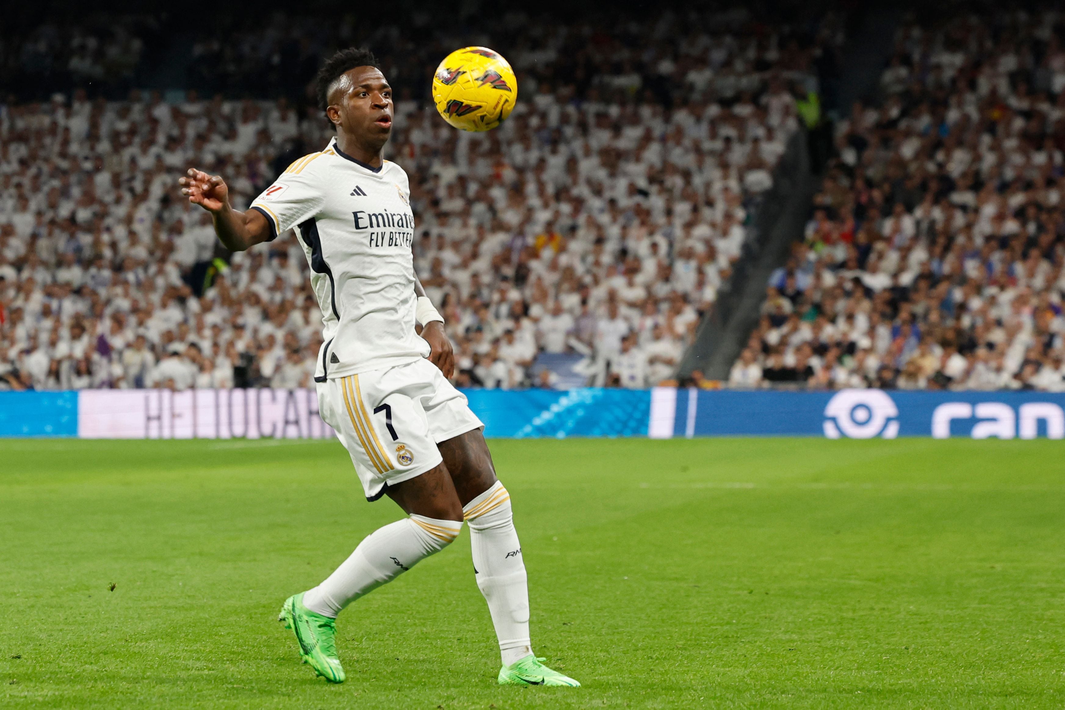 Real Madrid's Brazilian forward #07 Vinicius Junior controls the ball during the Spanish league football match between Real Madrid CF and FC Barcelona at the Santiago Bernabeu stadium in Madrid on April 21, 2024. (Photo by OSCAR DEL POZO / AFP)