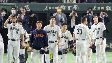 Shohei Ohtani (far R), Yu Darvish (far L) and other members of the Japan national baseball team acknowledge the crowd after beating Italy in their World Baseball Classic quarterfinal game at Tokyo Dome in Tokyo on March 16, 2023. (Photo by Kyodo News via Getty Images)
