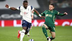 02 May 2021, United Kingdom, London: Tottenham Hotspur&#039;s Serge Aurier (L) and Sheffield United&#039;s Oliver Norwood battle for the ball during the English Premier League soccer match between Tottenham Hotspur and Sheffield United at the Tottenham Ho