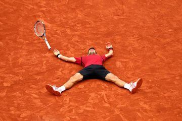 Novak allowed a little lie down after his first French title.