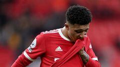 MANCHESTER, ENGLAND - FEBRUARY 26: Jadon Sancho of Manchester United reacts after their sides draw in the Premier League match between Manchester United and Watford at Old Trafford on February 26, 2022 in Manchester, England. (Photo by Nathan Stirk/Getty 