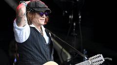Johnny Depp performs on stage with Jeff Beck during the Helsinki Blues Festival in Helsinki on June, 19, 2022