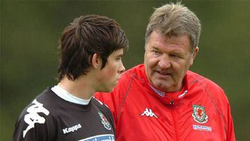 A young Gareth Bale on duty for Wales with coach, Toshack