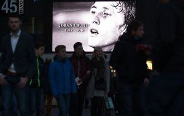A screen displays a picture in memory of late Dutch football legend Johann Cruyff prior to the friendly football match between the Netherlands and France at the Amsterdam ArenA, on March 25, 2016, in Amsterdam. Cruyff passed away on March 24, 2016 at the 