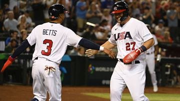 PHOENIX, ARIZONA - MARCH 13: Mike Trout #27 of the United States celebrates with Mookie Betts #3 after scoring on a double by Nolan Arenado against Canada during the first inning of a World Baseball Classic Pool C game at Chase Field on March 13, 2023 in Phoenix, Arizona.   Norm Hall/Getty Images/AFP (Photo by Norm Hall / GETTY IMAGES NORTH AMERICA / Getty Images via AFP)