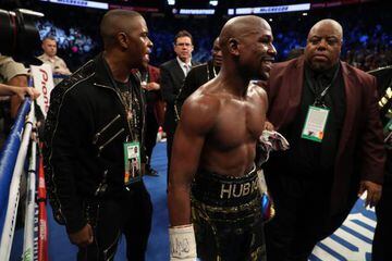 Floyd Mayweather Jr. celebrates after his TKO of Conor McGregor in their super welterweight boxing match