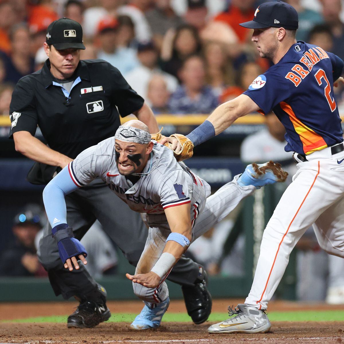 MLB adopts pitch clock, shift limits, bigger bases for 2023 season – The  Denver Post