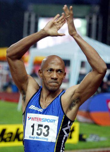 Frankie Fredericks of Namibia celebrates his victory in the men's 100m final at the Gugl-Meeting in Linz, Austria August 31, 2003.