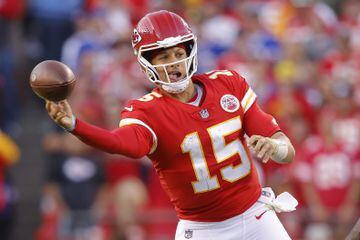 KANSAS CITY, MISSOURI - OCTOBER 16: Patrick Mahomes #15 of the Kansas City Chiefs throws the ball during the fourth quarter against the Buffalo Bills at Arrowhead Stadium on October 16, 2022 in Kansas City, Missouri.   David Eulitt/Getty Images/AFP