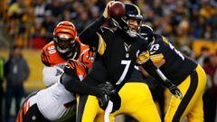 PITTSBURGH, PA - DECEMBER 30: Ben Roethlisberger #7 of the Pittsburgh Steelers is wrapped up for a sack by Christian Ringo #79 of the Cincinnati Bengals in the first half during the game at Heinz Field on December 30, 2018 in Pittsburgh, Pennsylvania.   J