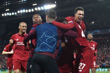 The Liverpool celebrate after scoring their fourth goal during the UEFA Champions league semi-final second leg football match between Liverpool and Barcelona at Anfield in Liverpool, north west England on May 7, 2019. (Photo by Paul ELLIS / AFP)