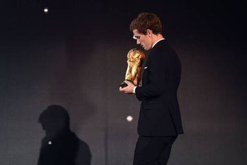 Griezmann, who was Alfredo Relaño's first-choice vote, carries the World Cup trophy during Monday's Ballon d'Or award ceremony in Paris.