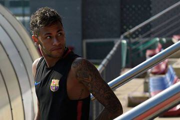 Neymar arrives for a training session at Barcelona's training ground on Monday.