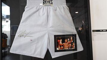 A pair of Cleto Reyes brand boxing trunks signed by Mike Tyson in gold marker (estimate USD $400-$600) are displayed at a press preview of Julien&#039;s Auctions Presents Icons And Idols: Rock &#039;N&#039; Roll, Hollywood and Sports, November 23, 2020 in