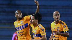 Tigres' Colombian Luis Quinones (L) clebrates with teammates after scoring against Motagua during the CONCACAF Champions League first leg quarterfinal football match between Motagua and Tigres, at the Olimpico Metropolitano stadium, in San Pedro Sula, on April 5, 2023. (Photo by Orlando SIERRA / AFP)