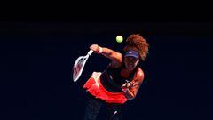 (FILES) In this file photo taken on February 18, 2021, Japan&#039;s Naomi Osaka serves against Serena Williams of the US during their women&#039;s singles semi-final match on day eleven of the Australian Open tennis tournament in Melbourne. - Defending ch