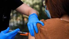 In this file photo a 15-year-old receives a first dose of the Pfizer Covid-19 vaccine at a mobile vaccination clinic at the Weingart East Los Angeles YMCA in Los Angeles, California.