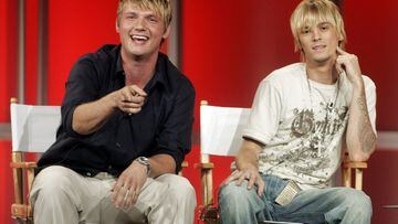 FILE PHOTO: Singers and brothers Nick (L) and Aaron Carter answer questions about their new reality television program 'House of Carters' which features them and their three sisters on E! Networks during a session at a Cable Television Critics Association press tour in Pasadena, California July 11, 2006. REUTERS/Fred Prouser/File Photo