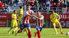 Ferni y &Aacute;lvaro Romero festejan uno de los goles del partido.