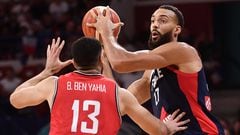 France's Rudy Gobert passes the ball during the FIBA Basketball World Cup 2023 Preparation match between France and Tunisia in Pau, southwestern France