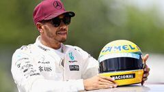 Lewis Hamilton y el casco de Senna. 