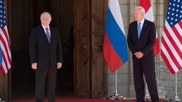 (FILES) In this file photo taken on June 16, 2021 US President Joe Biden (R) and Russian President Vladimir Putin arrive for a US-Russia summit at Villa La Grange in Geneva. - US President Joe Biden has agreed in principle to a meeting with his Russian co