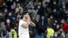 Marco Asensio celebrates after scoring Real Madrid&#039;s winning goal against Granada in LaLiga on Sunday. 