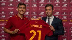 ALBUFEIRA, PORTUGAL - JULY 20: Paulo Dybala, with AS Roma General Manager Tiago Pinto, poses with AS Roma jersey on July 20, 2022 in Albufeira, Portugal. (Photo by Fabio Rossi/AS Roma via Getty Images)