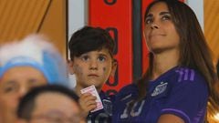 Argentina's forward #10 Lionel Messi's wife Antonela Roccuzzo and son Ciro wait in the tribune for the start of the Qatar 2022 World Cup Group C football match between Poland and Argentina at Stadium 974 in Doha on November 30, 2022. (Photo by Odd ANDERSEN / AFP) (Photo by ODD ANDERSEN/AFP via Getty Images)