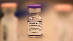 A vial of Pfizer COVID-19 booster vaccination sits on a table at a vaccination booster shot clinic in San Rafael, California.