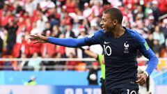 France&#039;s forward Kylian Mbappe celebrates scoring the opening goal during the Russia 2018 World Cup Group C football match between France and Peru at the Ekaterinburg Arena in Ekaterinburg on June 21, 2018. / AFP PHOTO / Anne-Christine POUJOULAT / RE