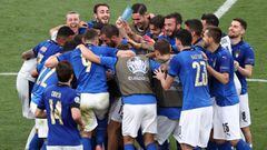 Italy players celebrate after beating Wales in the group stage. 