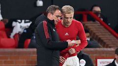 Manchester United German Interim head coach Ralf Rangnick (L) speaks with Manchester United&#039;s Dutch midfielder Donny van de Beek as he comes on as a substitute during the English FA Cup third round football match between Manchester United and Aston V