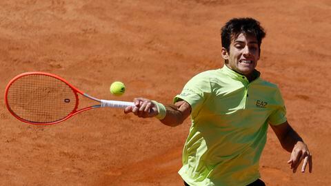 Rome (Italy), 13/05/2022.- Cristian Garin of Chile in action during his men's singles quarter final match against Alexander Zverev of Germany at the Italian Open tennis tournament in Rome, Italy, 13 May 2022. (Tenis, Alemania, Italia, Roma) EFE/EPA/FABIO FRUSTACI
