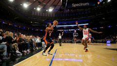 New York Knicks guard Jalen Brunson (11) shoots a three-point