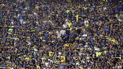 Boca Juniors&#039; supporters cheer for their team during the Argentina First Division Superliga Tournament football match against Argentinos Juniors at La Bombonera stadium, in Buenos Aires, on November 30, 2019. (Photo by ALEJANDRO PAGNI / AFP)